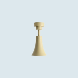 Una lampada da parete minimalista in un colore pastello pistacchio della collezione KIBO Szpunar x Artera